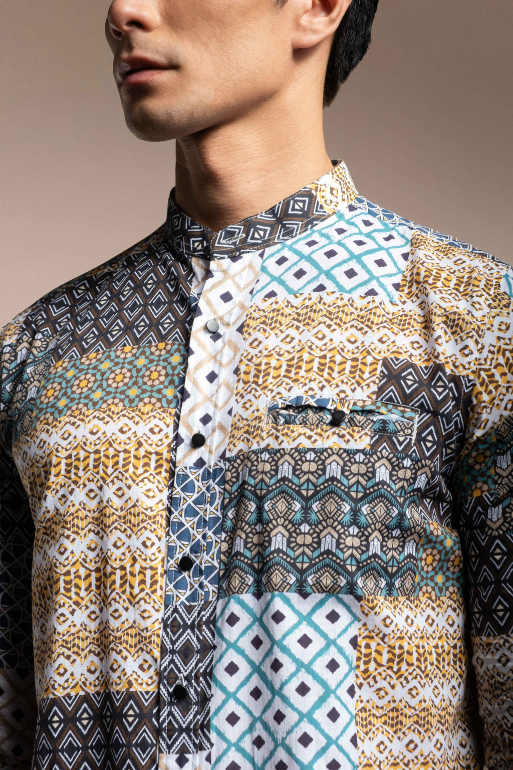 Man wearing a Onésimus Men's Casual Shirts Geometric Prints in various colors.