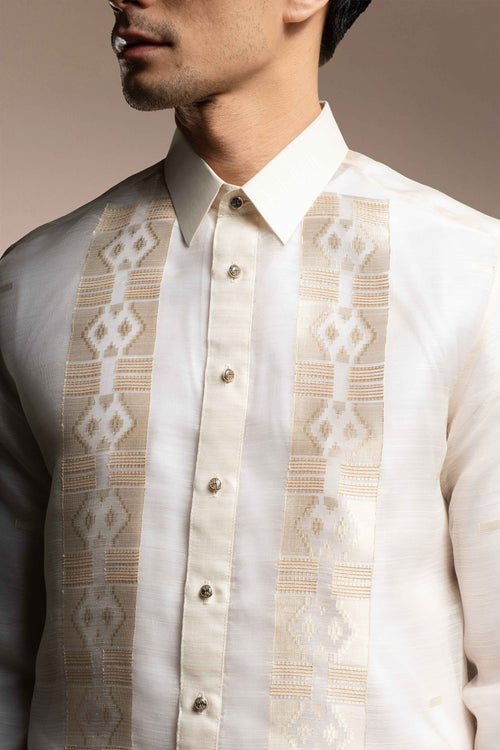 Man wearing a Onésimus Barong Philippines Handwoven Pineapple Leaves Fiber against a neutral background
